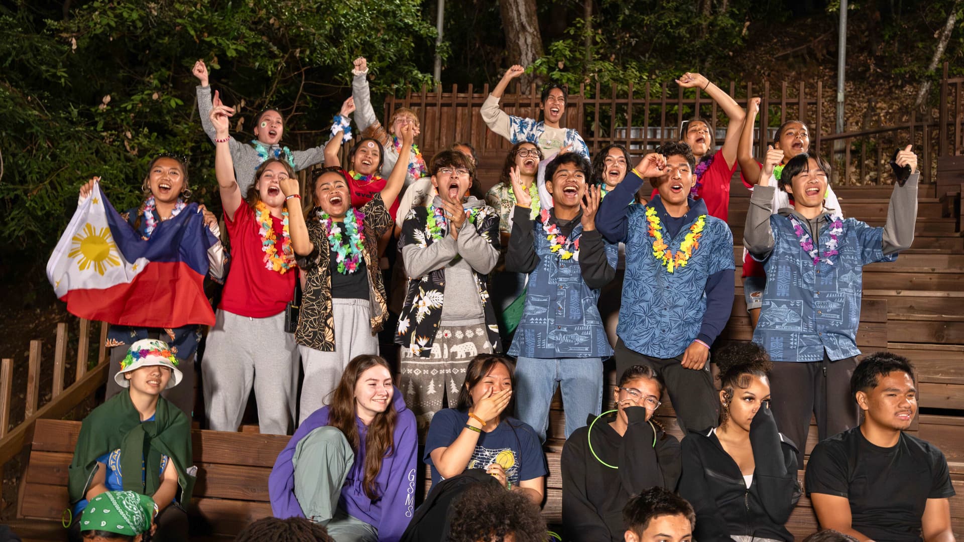 Teens cheering at camp